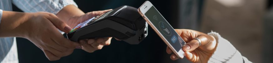 person-paying-with-nfc-technology-restaurant